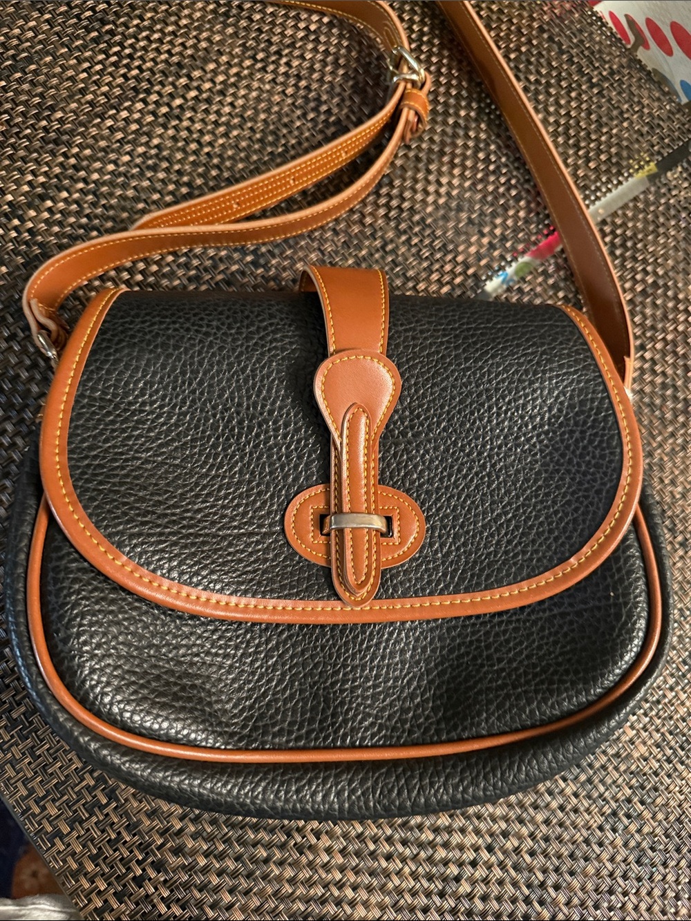 Dooney and Burke Black and Tan Pebbled Leather Crossbody Bag
